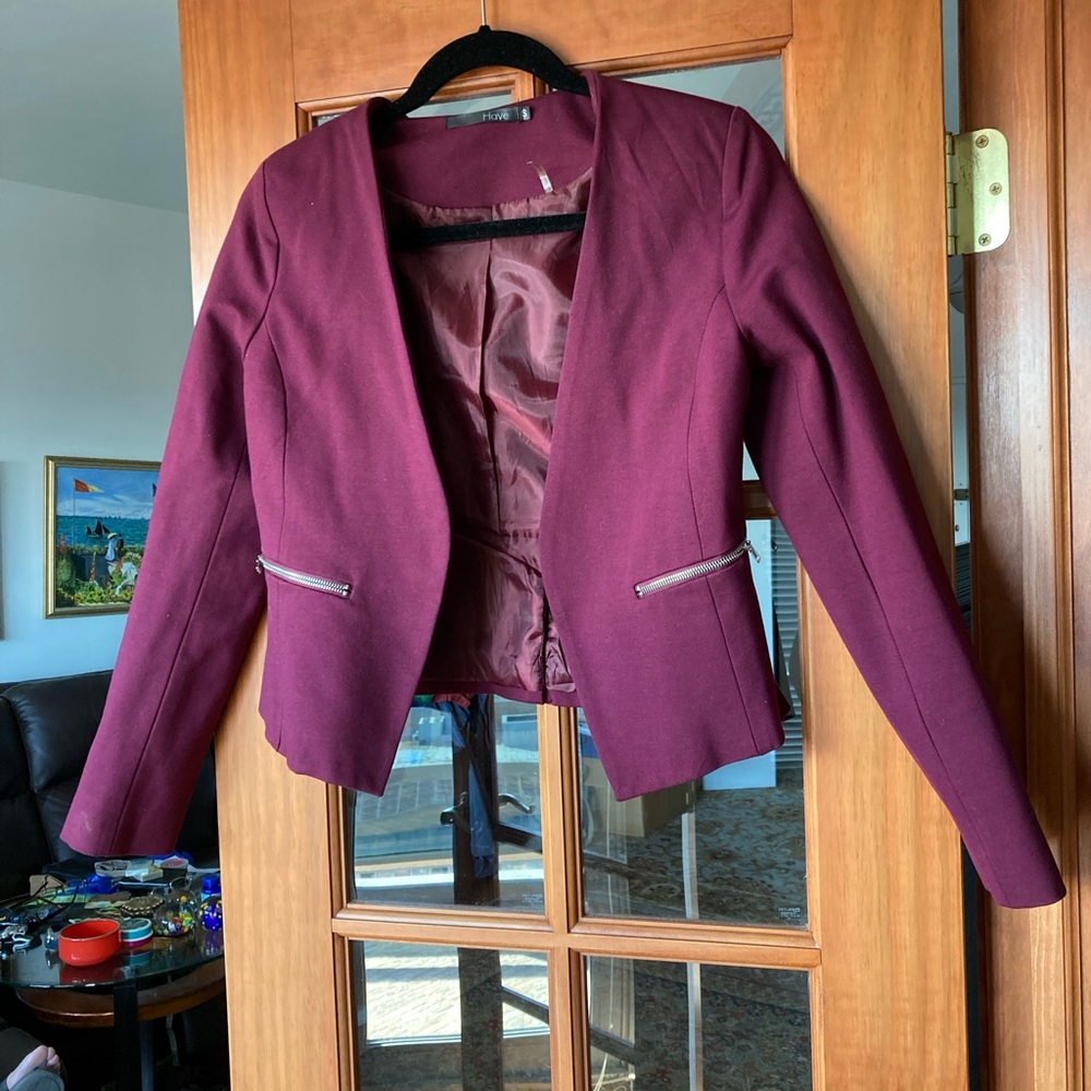HAVE cropped wine color lined jacket.  Size small
